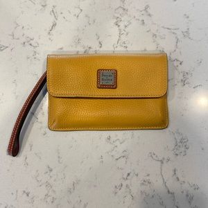 Dooney & Bourke Mustard yellow wristlet